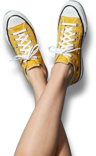 Yellow sneakers representing European made footwear